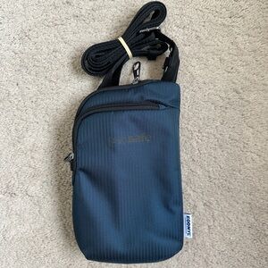 PACSAFE Econyl Daysafe Crossbody Bag Navy Never used.